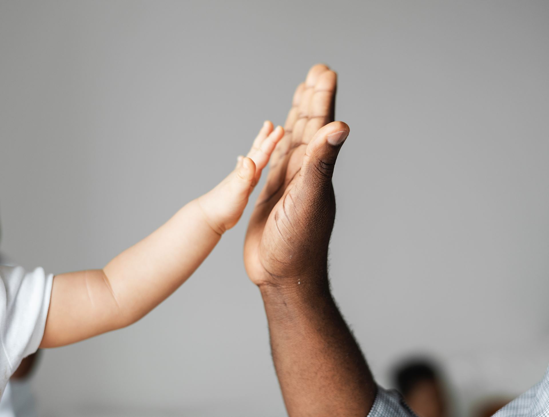 a hand holding a cell phone